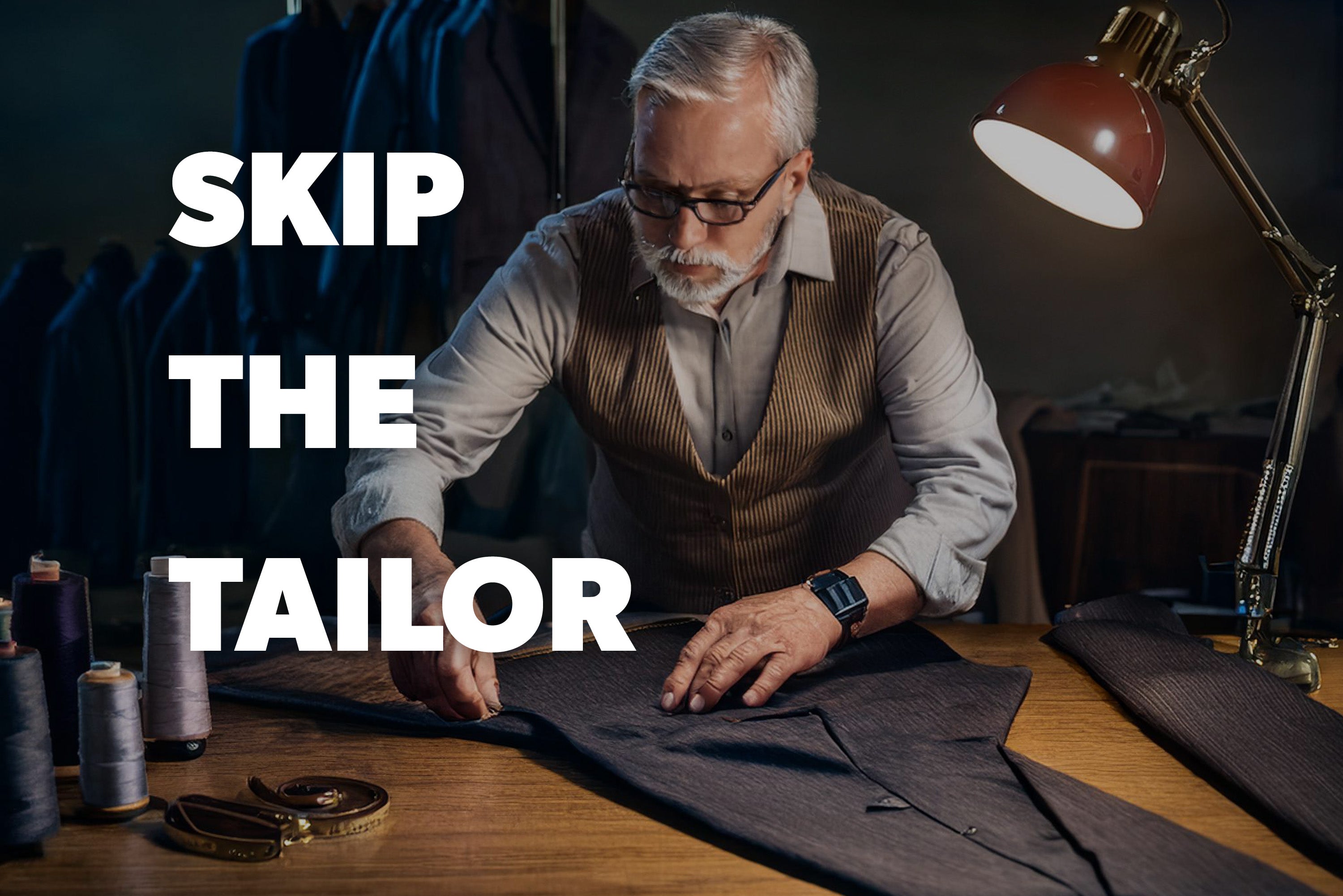 A tailor working on a suit with sewing materials around.